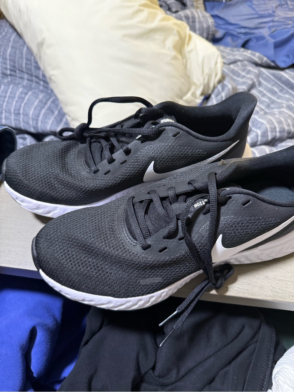 Nike Women’s Black Running Shoes with White Swoosh